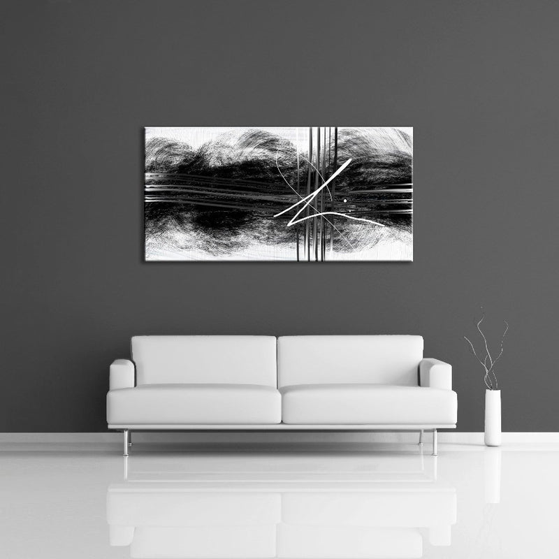 An modern abstract painting featuring black swirls on a white canvas displayed on a wall. 