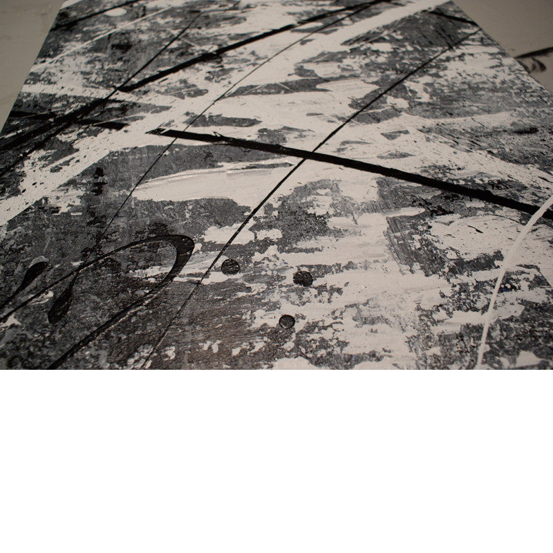 Close up image of a grey, white and black modern abstract painting with abstract art textures