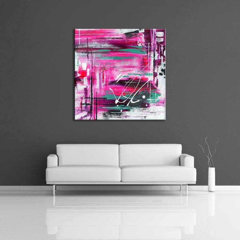 A modern abstract painting featuring pink, white and turquoise on a gray wall.  