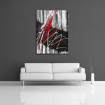 A modern abstract painting featuring the colors black, white, gray and red. This painting is displayed on a wall.