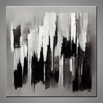 An abstract painting featuring the colours gray, black and white.