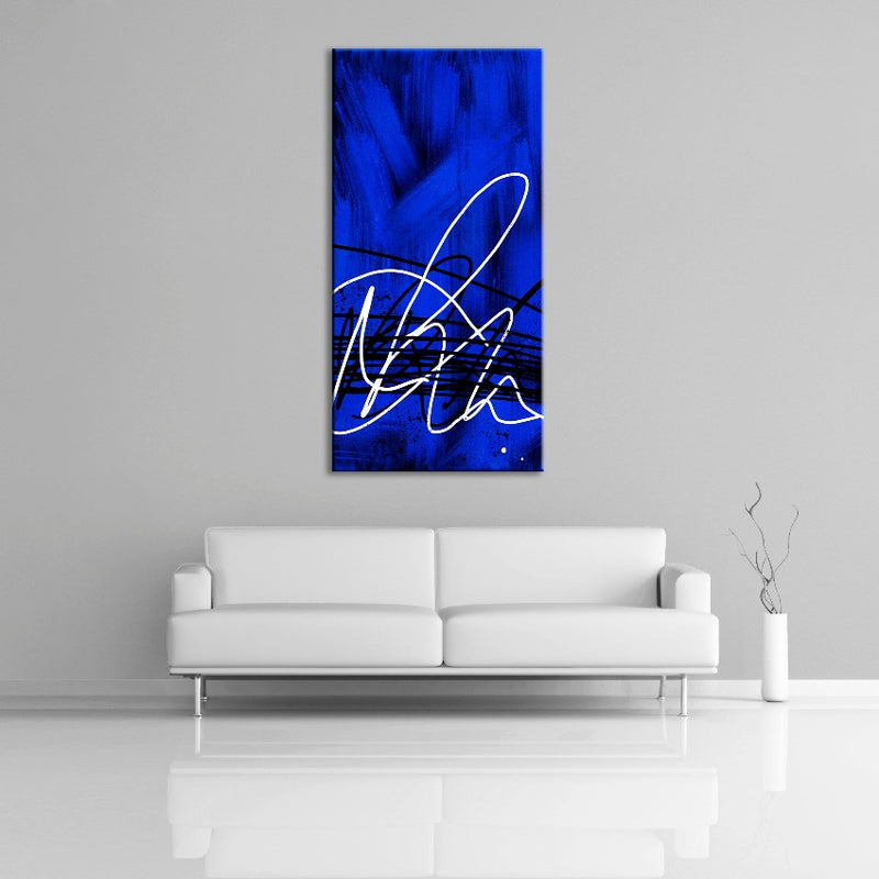 A modern abstract painting featuring the colours dark blue, black and white. Displayed over a couch.