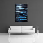 An abstract painting featuring horizontal black and blue lines. Displayed on a wall.