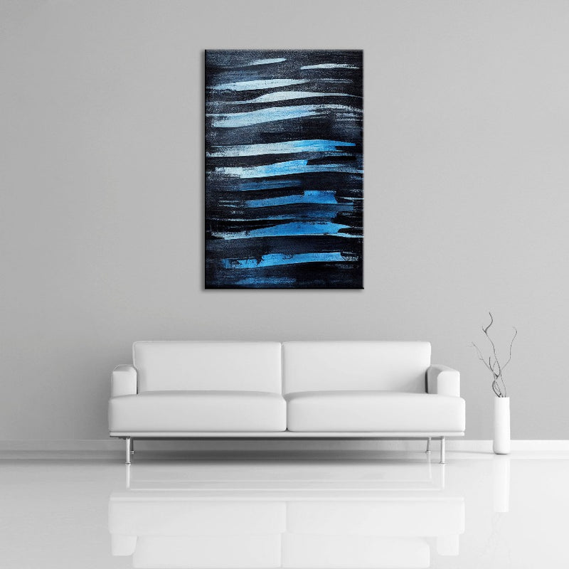 An abstract painting featuring horizontal black and blue lines. Displayed over a couch.