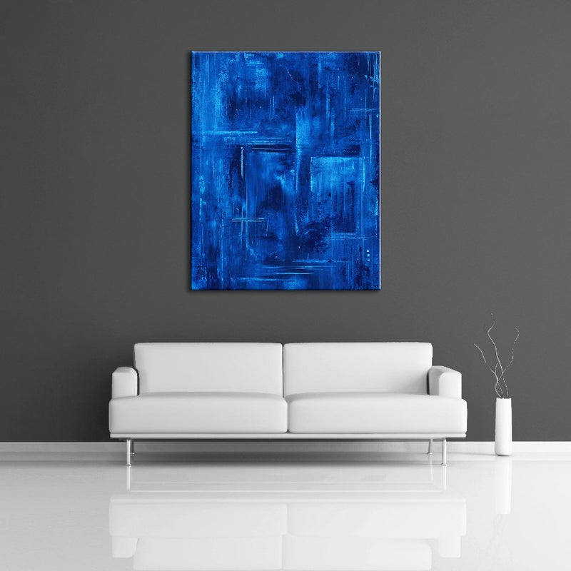 A modern abstract painting featuring the colour blue. Displayed on a wall.