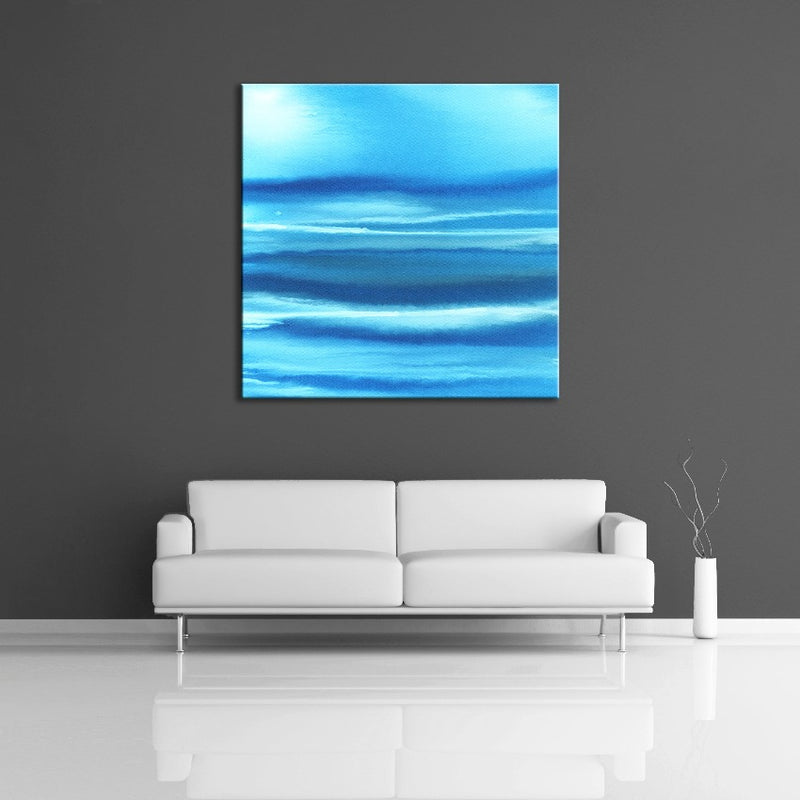 A modern abstract painting featuring the colours light and dark blue with a little white. Displayed on a wall.