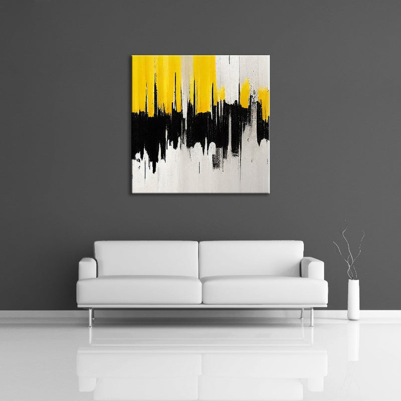 An abstract painting featuring off-white, black and yellow.  Displayed on a wall.